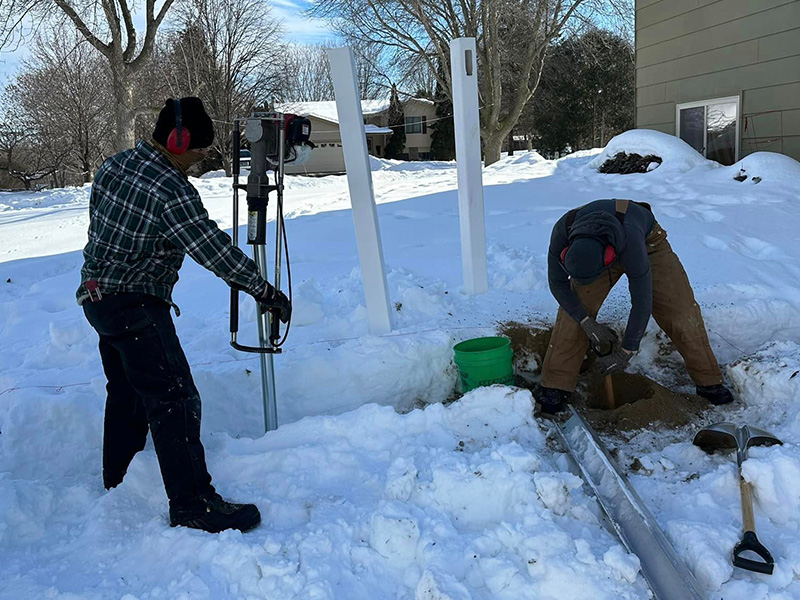 Local fence contractor driving posts  West Metro Minnesota Minnesota